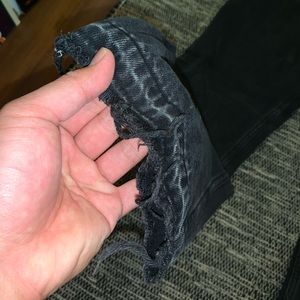 Distressed black jeans